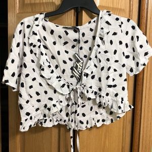 Speckled white and black tie front top